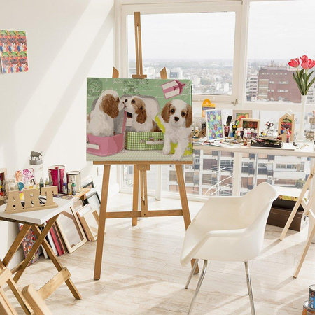 Nette Welpen in Koffern. Malen nach Zahlen